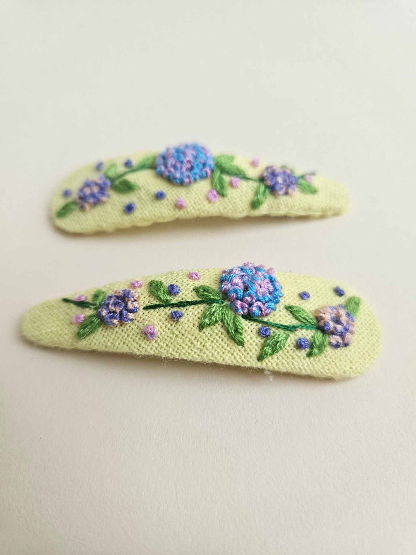 Hand- embroidered hair clips
